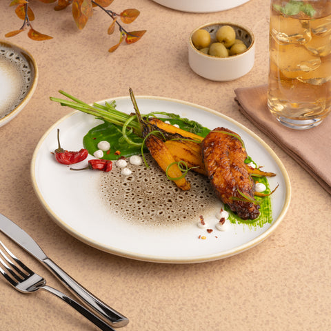 Ariane Retail 9 5/6'' x 8 7/9'' Jaguar Porcelain Elevated Oval Plate - 6/Case (ARTARND52101007)