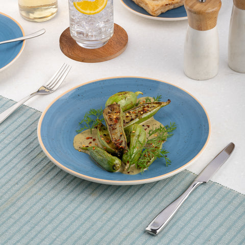 Ariane Vital Coupe 7" Twister Blue Porcelain Coupe Round Rimless Plate - 12/Case (AVCARN264011018)