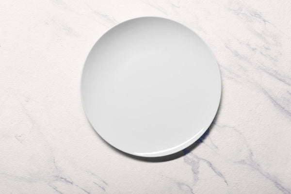 Ariane 10 5/8" Vital Coupe - Warm White Porcelain Coupe Elevated Plate - 12/Case (AVCARN000111027) - iFoodservice Online