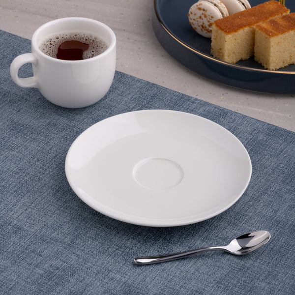 Ariane 6 2/7" Vital Coupe - Warm White Porcelain Coupe Round Rimless Tea/Coffee Saucer - 12/Case (AVCARN000014002) - iFoodservice Online