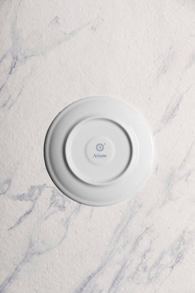 Ariane 6 2/7" Vital Coupe - Warm White Porcelain Coupe Round Rimless Tea/Coffee Saucer - 12/Case (AVCARN000014002) - iFoodservice Online