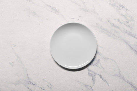 Ariane 7" Vital Coupe - Warm White Porcelain Coupe Elevated Plate - 12/Case (AVCARN000111018) - iFoodservice Online