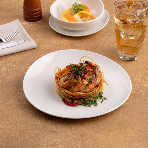 Ariane 8 1/4" Vital Coupe - Warm White Porcelain Coupe Elevated Plate - 12/Case (AVCARN000111021) - iFoodservice Online