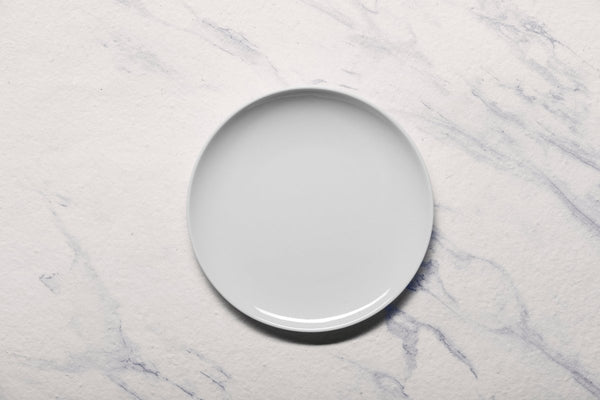 Ariane 8 1/4" Vital Coupe - Warm White Porcelain Coupe Elevated Plate - 12/Case (AVCARN000111021) - iFoodservice Online