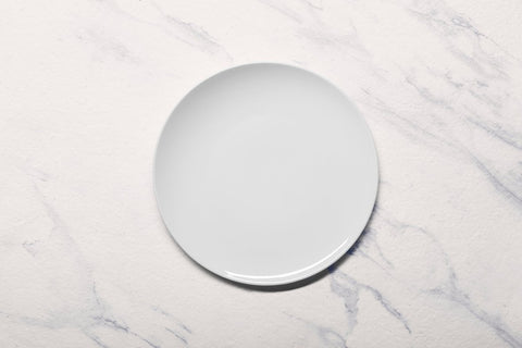 Ariane 9 4/9" Vital Coupe - Warm White Porcelain Coupe Elevated Plate - 12/Case (AVCARN000111024) - iFoodservice Online