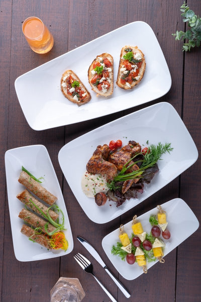 Ariane 9 4/9" x 5 1/8" Vital - Warm White Porcelain Rectangle Plate - 12/Case (AVRARN000011024) - iFoodservice Online