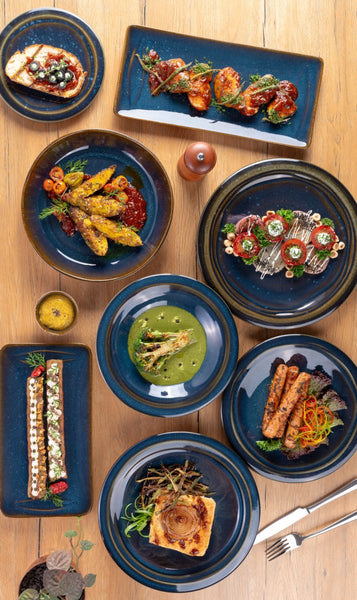 Ariane Laps 9 4/9" Splash Denim Porcelain Flat Plate - 12/Case (ALPARND53011024) - iFoodservice Online