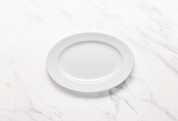 Ariane Prime 10 1/4" Prime - Warm White Porcelain Oval Platter - 12/Case (APRARN000015026) - iFoodservice Online