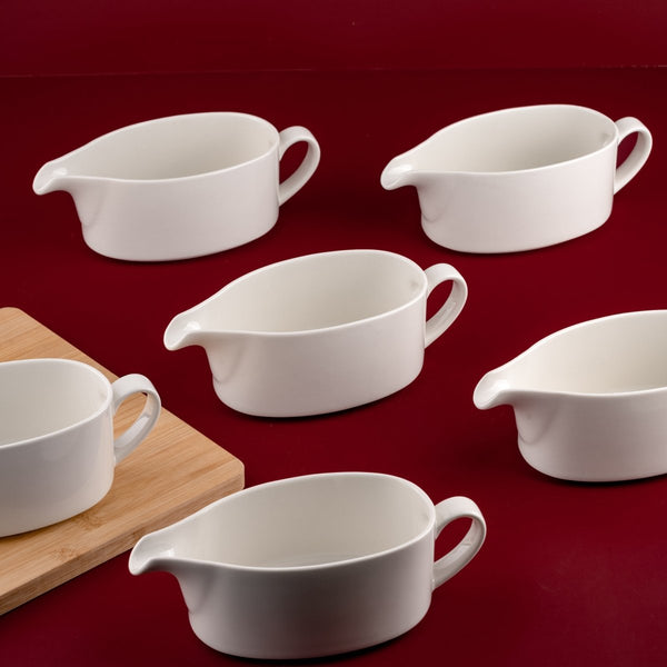 Ariane Prime 11 5/6 Oz Prime - Warm White Porcelain Oval Gravy Boat - 6/Case (APRARN000031035) - iFoodservice Online