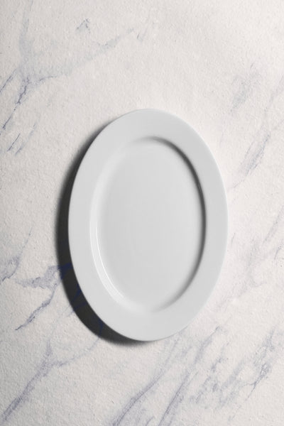 Ariane Prime 12 3/5'' x 8 2/3'' Orba White Porcelain Oval Platter - 6/Case (APRARN121015032) - iFoodservice Online