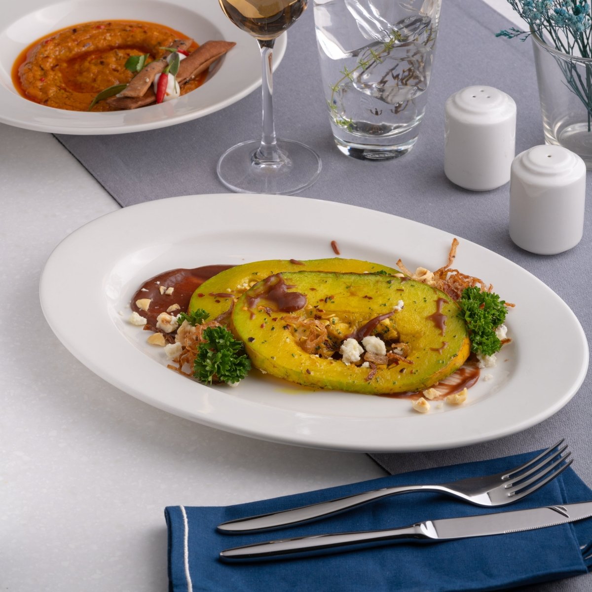 Ariane Prime 14 1/6'' x 10'' Prime - Warm White Porcelain Oval Platter - 6/Case (APRARN000015036) - iFoodservice Online