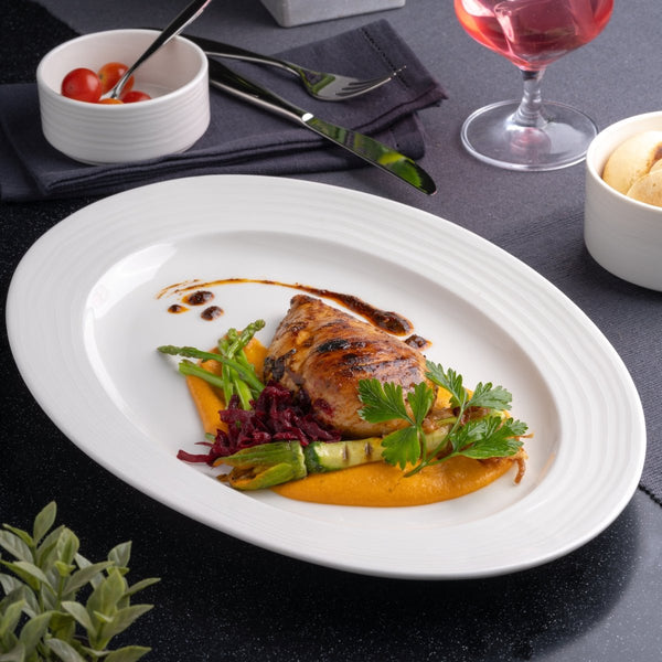 Ariane Prime 14 1/6'' x 8 2/3'' Eclipse White Porcelain Oval Platter - 6/Case (APRARN120015036) - iFoodservice Online