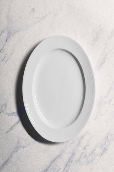 Ariane Prime 14 1/6'' x 8 2/3'' Eclipse White Porcelain Oval Platter - 6/Case (APRARN120015036) - iFoodservice Online