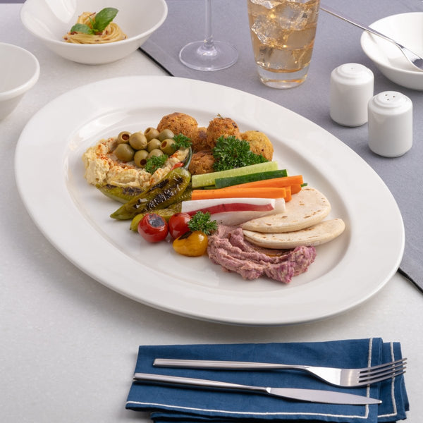 Ariane Prime 17 5/7" x 12 2/5'' Prime - Warm White Porcelain Oval Platter - 3/Case (APRARN000015045) - iFoodservice Online