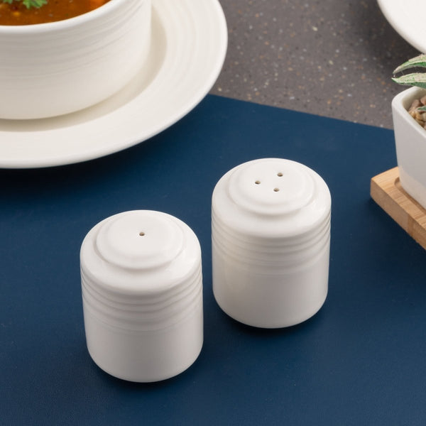 Ariane Prime 2 1/5" White Eclipse Porcelain Pepper Shaker - 12/Case (APRARN120072001) - iFoodservice Online