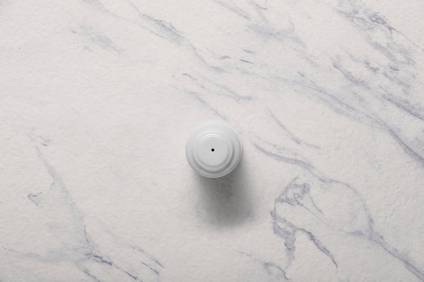 Ariane Prime 2 1/5" White Orba Porcelain Pepper Shaker - 12/Case (APRARN121072001) - iFoodservice Online