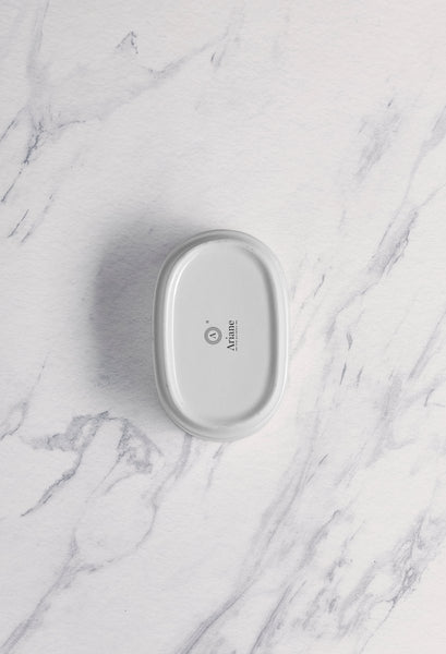 Ariane Prime 3 1/2" x 2" White Orba Porcelain Sugar Pack Holder - 12/Case (APRARN121077001) - iFoodservice Online