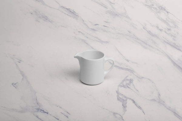 Ariane Prime 5 Oz Orba Porcelain Creamer With Handle - 12/Case (APRARN121064015) - iFoodservice Online
