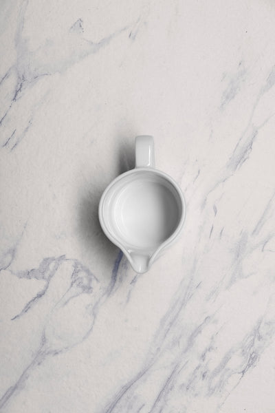 Ariane Prime 5 Oz Orba Porcelain Creamer With Handle - 12/Case (APRARN121064015) - iFoodservice Online