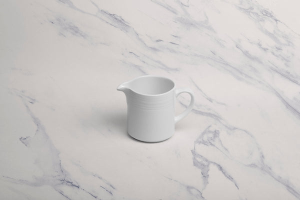 Ariane Prime 5 Oz White Eclipse Porcelain Creamer With Handle - 12/Case (APRARN120064015) - iFoodservice Online