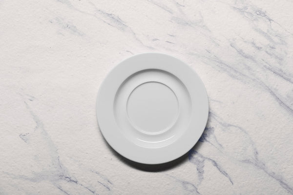 Ariane Prime 6 2/3" Prime - Warm White Porcelain Saucer - 12/Case (APRARN000014017) - iFoodservice Online