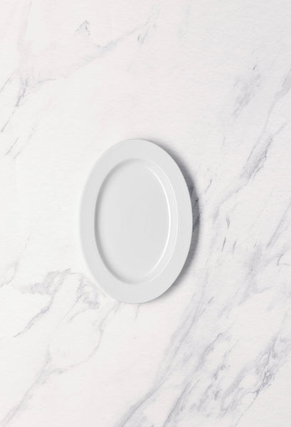 Ariane Prime 8 2/3'' x 6 1/9" Eclipse White Porcelain Oval Platter - 12/Case (APRARN120015022) - iFoodservice Online