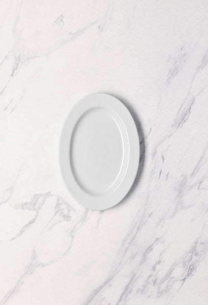 Ariane Prime 8 2/3'' x 6 1/9" Orba White Porcelain Oval Platter - 12/Case (APRARN121015022) - iFoodservice Online