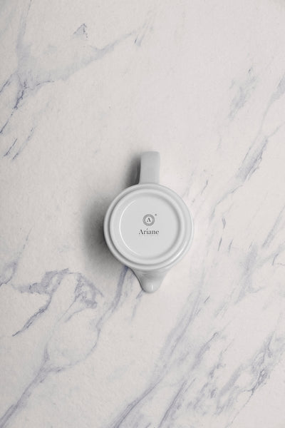 Ariane Prime 8 4/9 Oz Orba White Porcelain Creamer With Handle - 12/Case (APRARN121064025) - iFoodservice Online