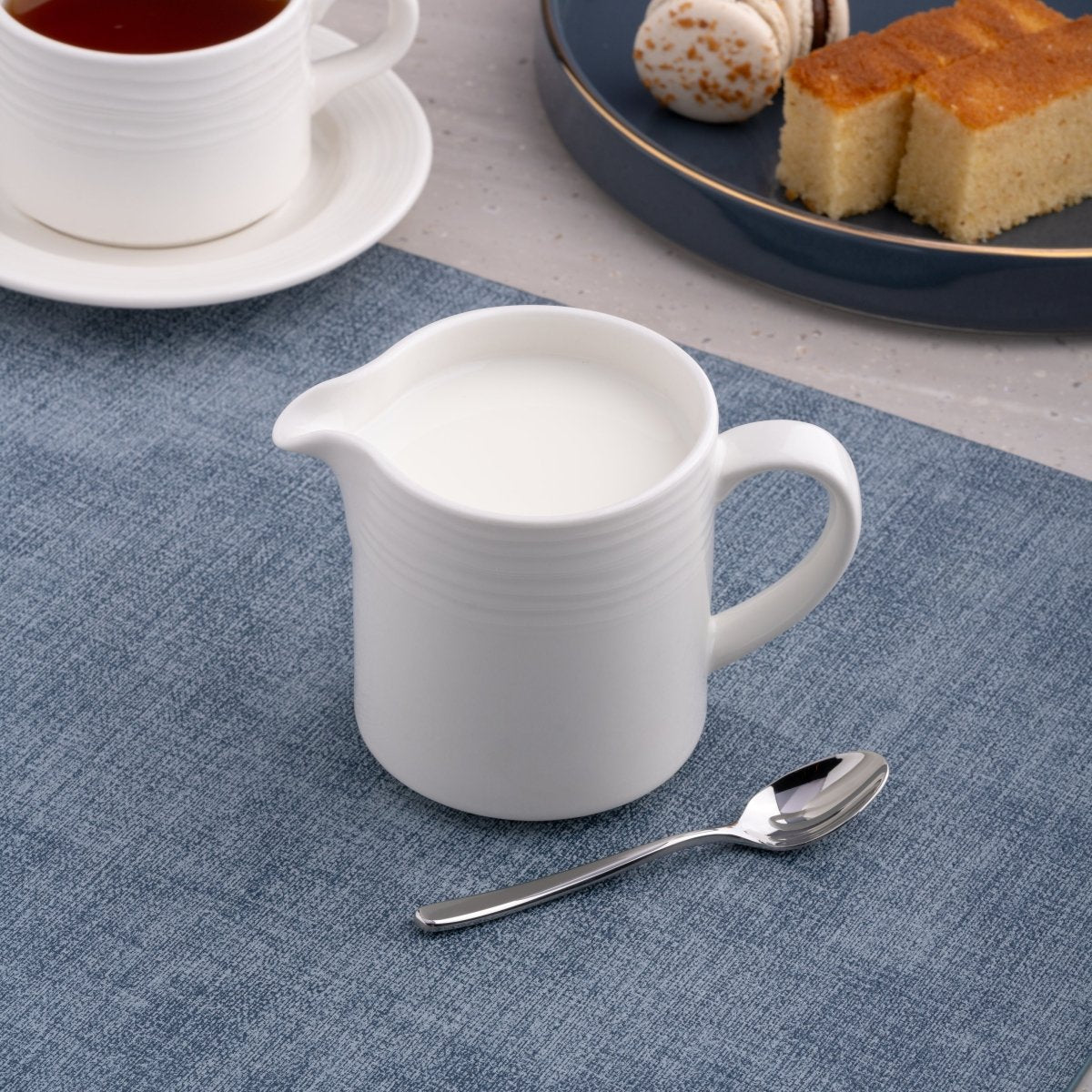 Ariane Prime 8 4/9 Oz White Eclipse Porcelain Creamer With Handle - 12/Case (APRARN120064025) - iFoodservice Online