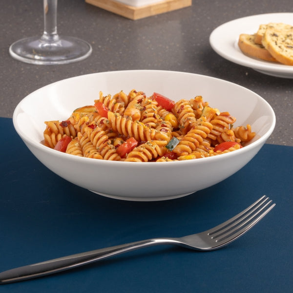 Ariane Vital Coupe 10 1/4" Vital Coupe - Warm White Porcelain Coupe Round Cous Cous Deep Plate - 6/Case (AVCARN000012002) - iFoodservice Online