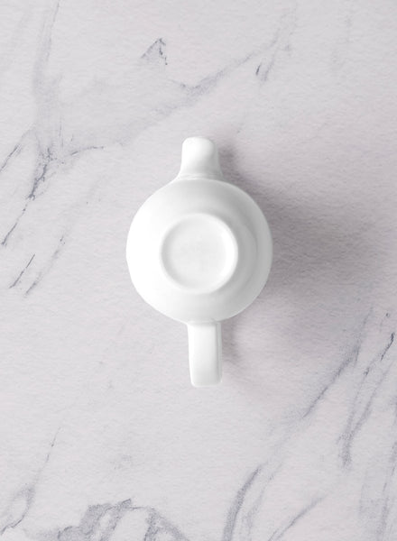 Ariane Vital Coupe 11 5/6 Oz Vital Coupe - Warm White Porcelain Coupe Creamer With Handle - 6/Case (AVCARN000064035) - iFoodservice Online