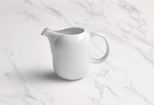 Ariane Vital Coupe 11 5/6 Oz Vital Coupe - Warm White Porcelain Coupe Creamer With Handle - 6/Case (AVCARN000064035) - iFoodservice Online