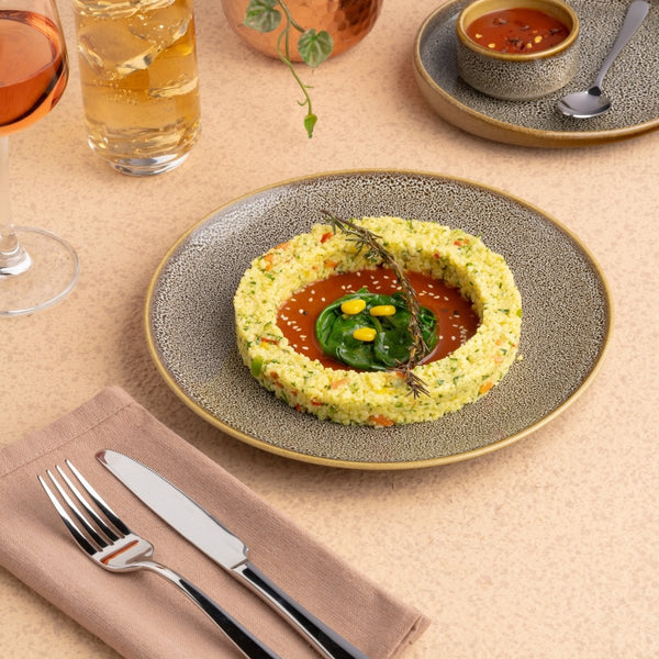 Ariane Vital Coupe 8 1/4" Freckles Porcelain Coupe Round Rimless Plate - 12/Case (AVCARNC97011021) - iFoodservice Online