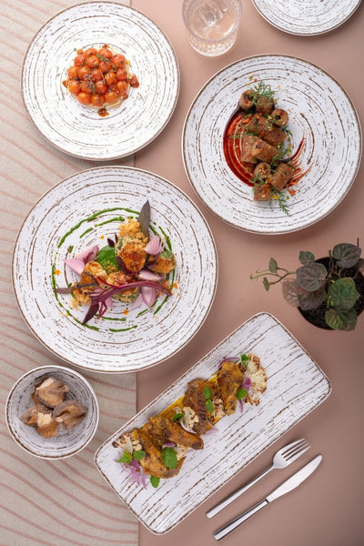 Ariane Vital Coupe 8 1/4" Tornado - Dessert Sage Porcelain Coupe Round Rimless Plate - 12/Case (AVCARN429011021) - iFoodservice Online