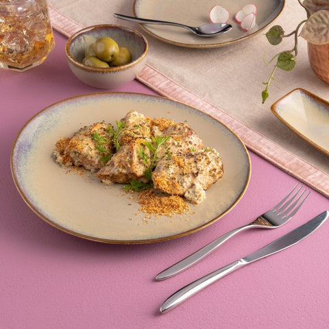 Ariane Vital Coupe 9 4/9" Splash Beige Porcelain Elevated Plate - 12/Case (AVCARN257111024) - iFoodservice Online