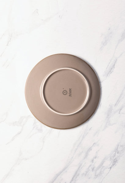 Ariane Vital Coupe 9 4/9" Splash Beige Porcelain Elevated Plate - 12/Case (AVCARN257111024) - iFoodservice Online