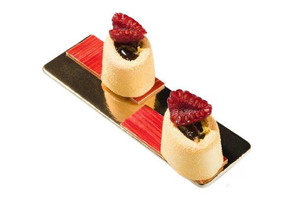 Louis Tellier Silikomart - Small Oval Savarin Red Mold 1 3/4'' X 1 1/4'' X 1'' H (SF083) - iFoodservice Online